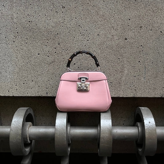 Gucci Bamboo Lady Lock Pink Bag with Silver hardware and detachable strap.