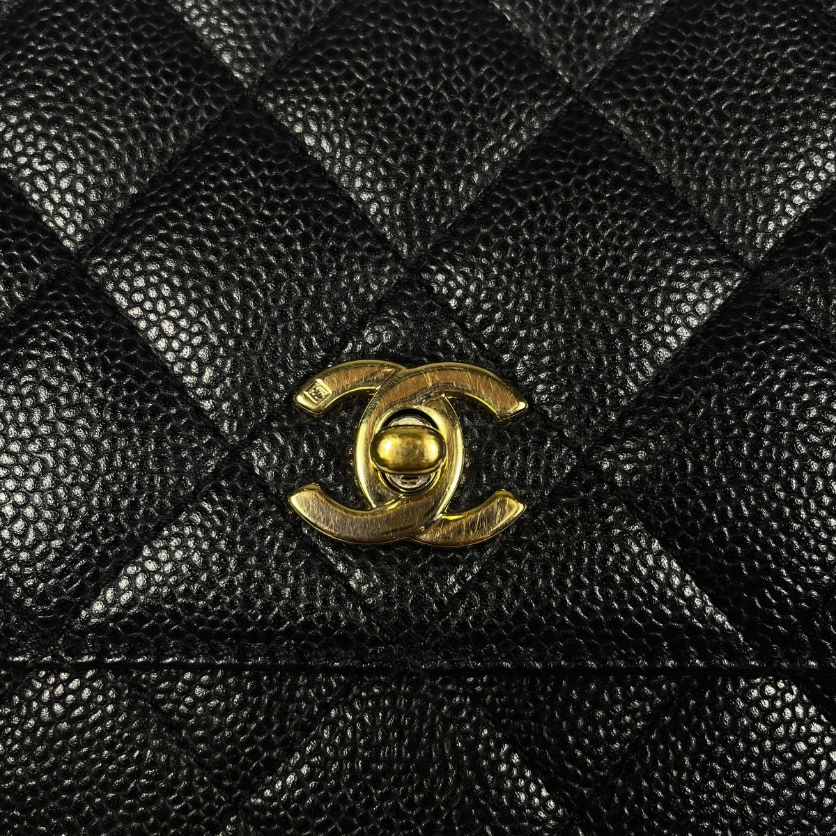 Chanel Kelly Top Handle Bag with Caviar leather and 24 carat gold hardware pre-loved pre-owned