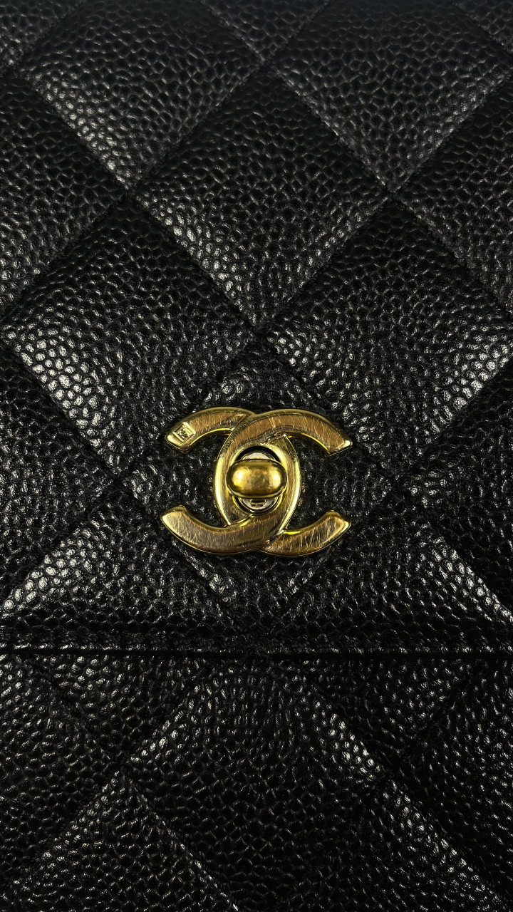 Chanel Kelly Top Handle Bag with Caviar leather and 24 carat gold hardware pre-loved pre-owned