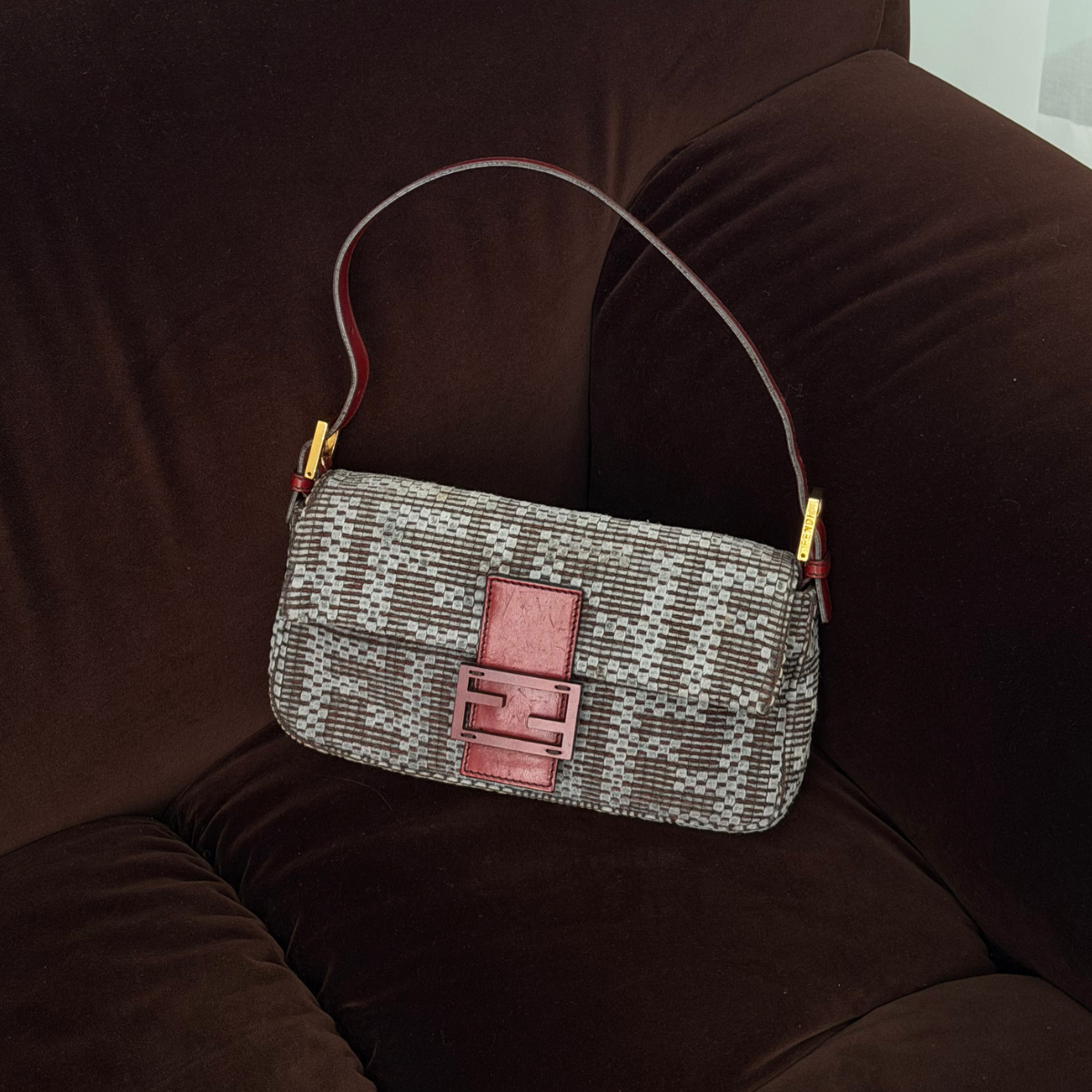 Fendi Woven Baguette Grey with Cherry red leather hardware, style shot