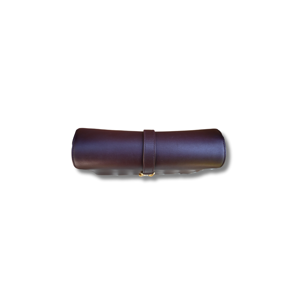 A burgundy Saint Laurent satchel crossbody bag with a gold-finish logo, displayed against a white background