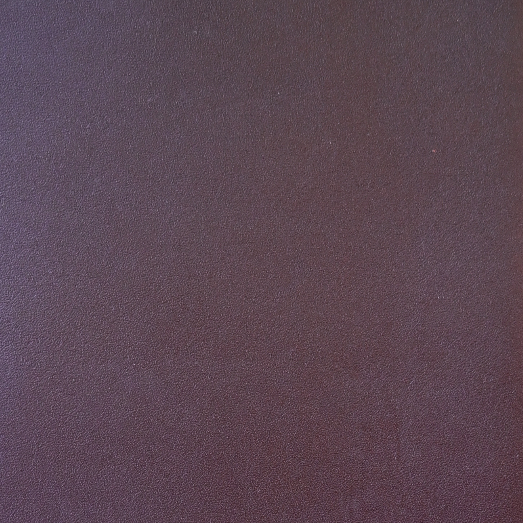 A burgundy Saint Laurent satchel crossbody bag with a gold-finish logo, displayed against a white background