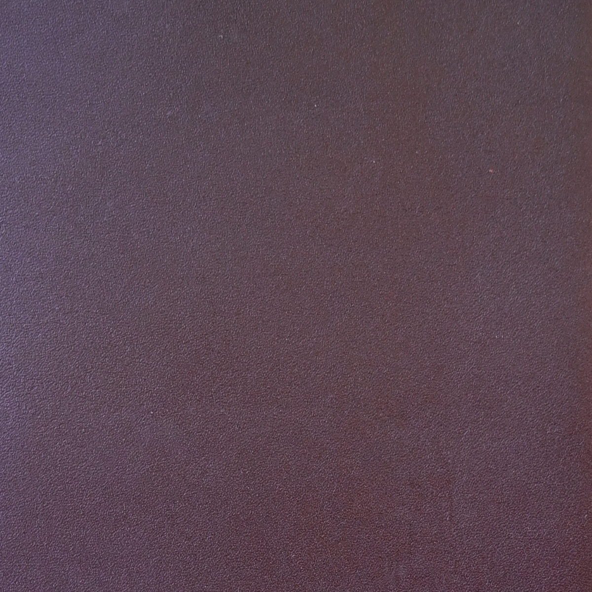 A burgundy Saint Laurent satchel crossbody bag with a gold-finish logo, displayed against a white background