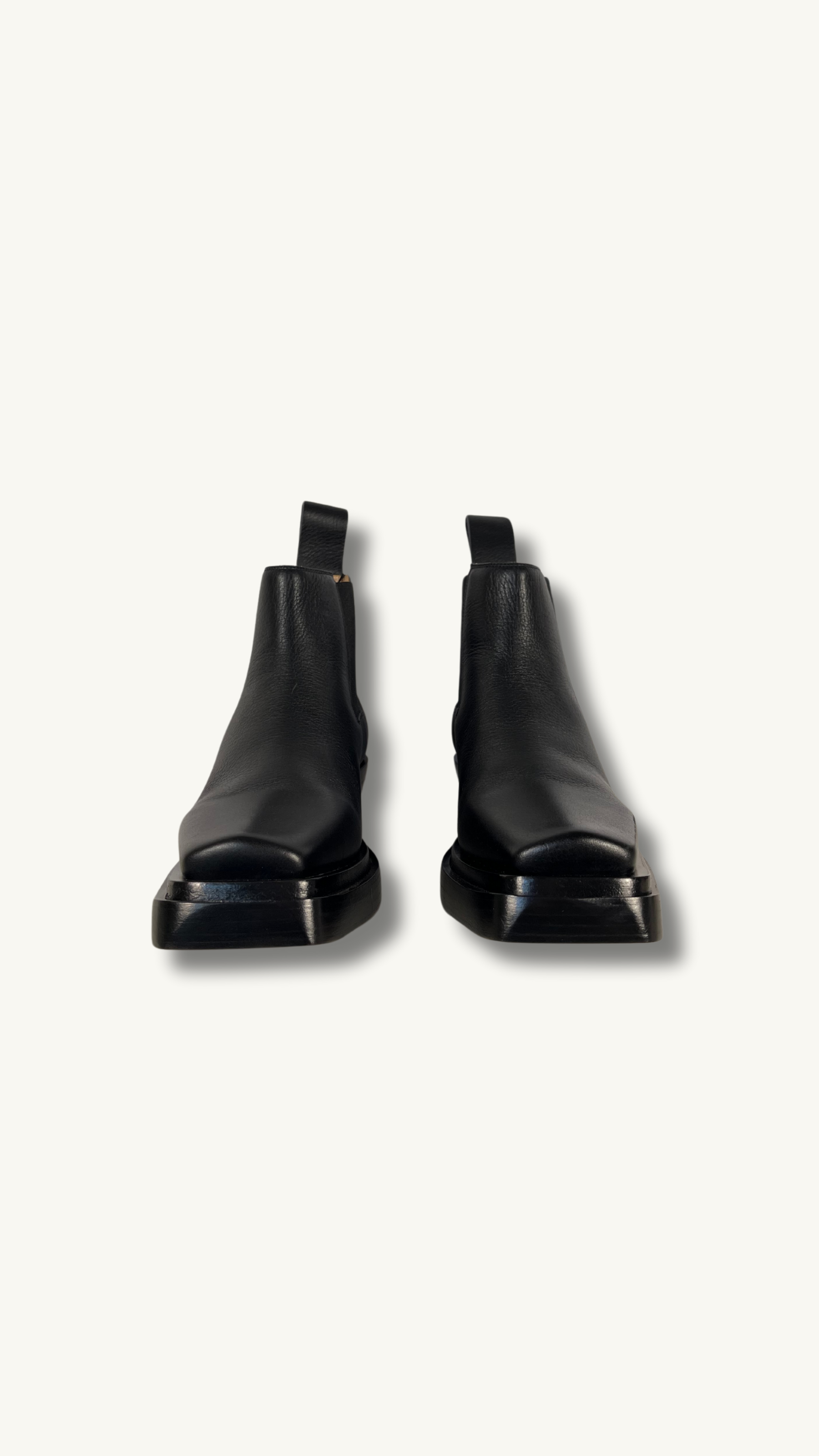 Bottega Veneta Lean Chelsea Boot with square toes and leather pull-loop at heel collars.