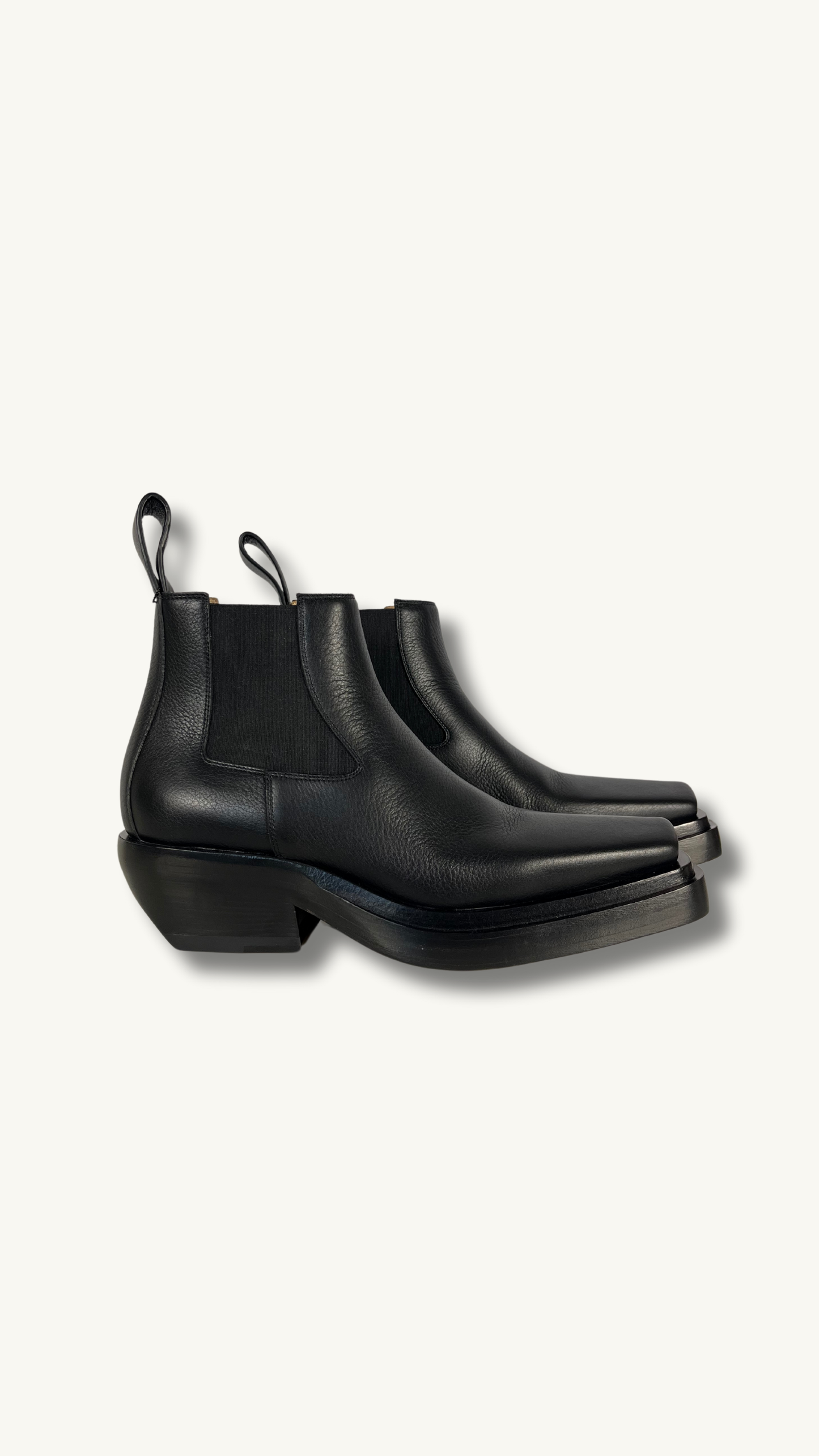 Bottega Veneta Lean Chelsea Boot with square toes and leather pull-loop at heel collars.