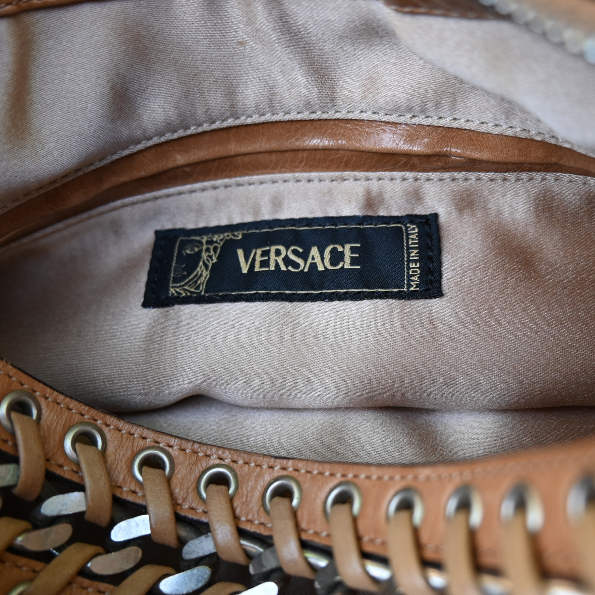 Vintage Versace crescent shoulder bag. Pony hair animal print and cognac brown leather Y2K