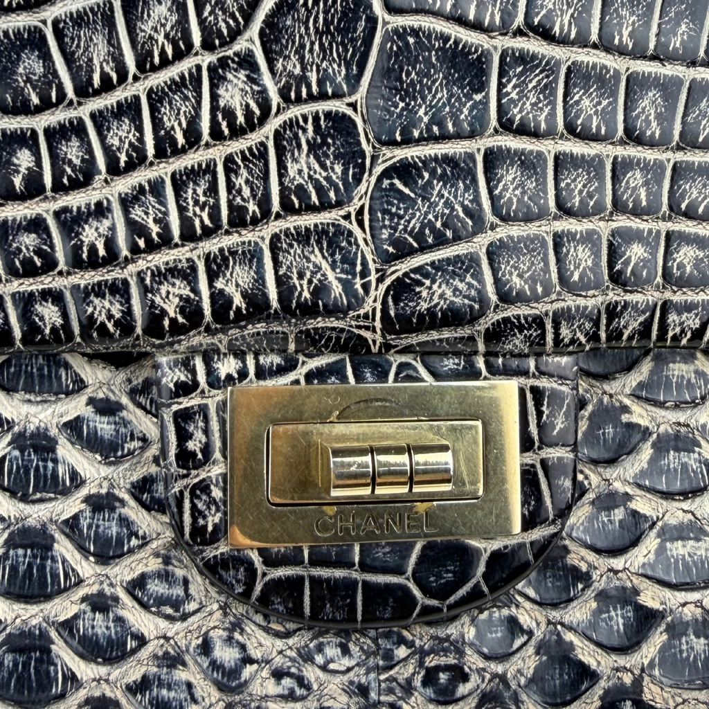 Chanel 2.55 Crocodile Crossbody bag close up of turn-lock